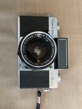 Silver and Black Vintage Film Camera with 35mm Lens